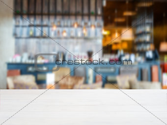 Wooden board empty table in front of blurred cafe