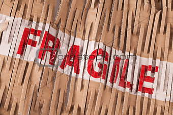 Fragile tape label across packaging
