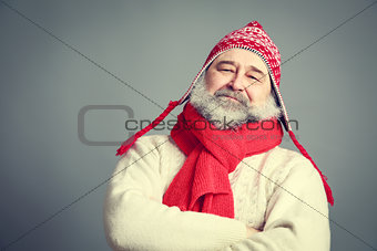 Serious Old Man with Beard in Funny Winter Clothes