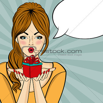 Surprised pop art  woman that holds a gift in their hands . Comi
