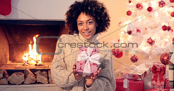Close up of beautiful black woman holding present