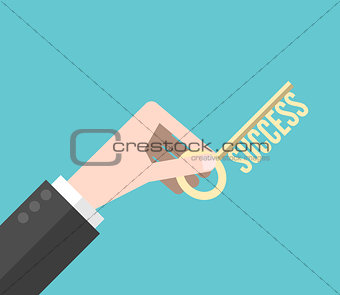 Hand holding success key
