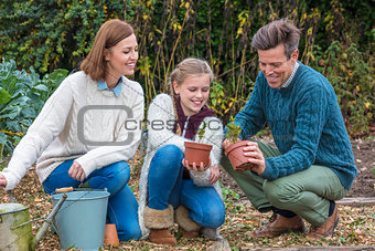 Happy Family Girl Child Father Mother Daughter Gardening