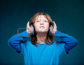 Boy Listening to Music in Headphones