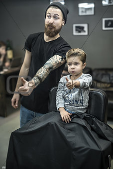 Small kid in barbershop