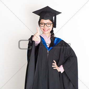 University student thumb up