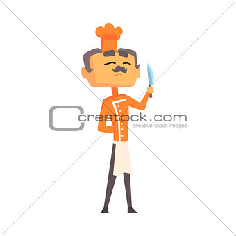 Professional Cook In Classic Double Breasted Orange Jacket And Toque Standing Proud With Knife