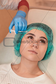 Beautiful woman gets injections.
