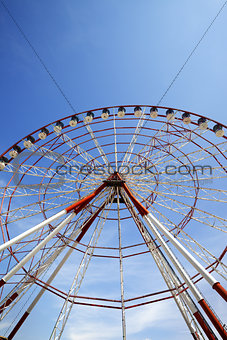 Ferris wheel and blue sky in sun day