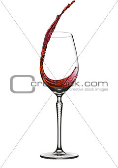 Pouring wine to elegant wineglass with splash