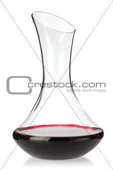 Glass decanter with organic red wine.