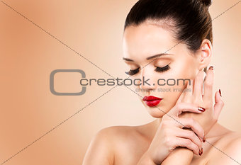 fashion woman with perfect skin wearing dramatic makeup