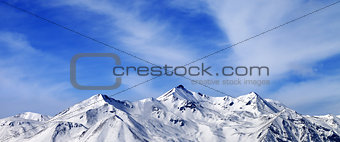 Panoramic view on winter snow mountains