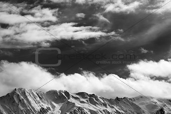 Black and white winter snow mountains at nice sunny day