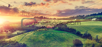 Picturesque sunset over green hills sunshine Italy