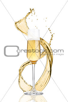 Glass of yellow champagne with splashes bubbles