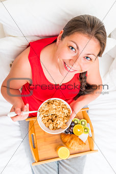 have breakfast cute woman smiling, view from above