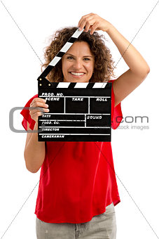 Happy mature woman holding a clapboard