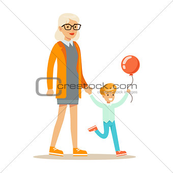 Grandmother And Boy With Balloon Holding Hands Walking, Part Of Grandparents Having Fun With Grandchildren Series