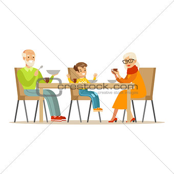 Grandfather, Grandmother And Boy Having Dinner, Part Of Grandparents Having Fun With Grandchildren Series