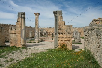 Ruined stone arch in ancient roman city Volubilis