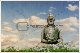 Budda statue on a beautiful meadow 