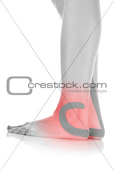 Therapeutic tape on female foot.