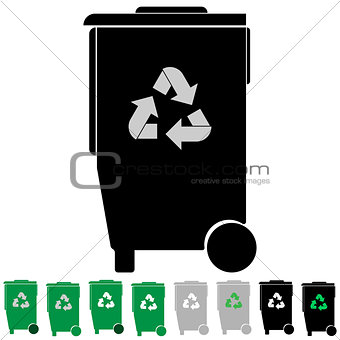Black and green refuse bin or debris utilization.