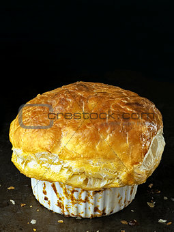 rustic golden english meat pot pie with flaky crust