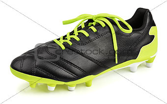black leather football shoe or soccer boot isolated on white