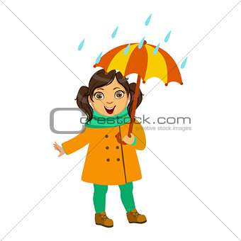 Girl In Yellow Coat And Scarf, Kid In Autumn Clothes In Fall Season Enjoyingn Rain And Rainy Weather, Splashes And Puddles