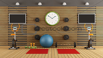 Wooden room with gym equpment
