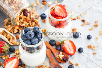 Delicious plain yogurt with fresh blueberry and strawberry in a 