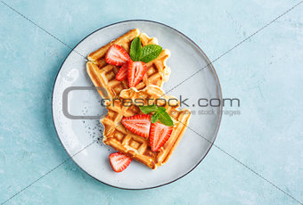 Homemade waffles with strawberries