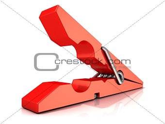 Red plastic clothes pin. Opened