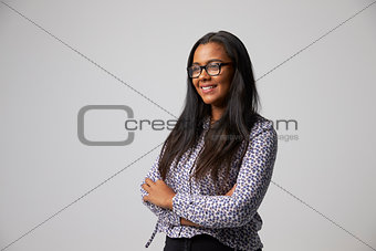 Studio Portrait Of Female Fashion Buyer Wearing Spectacles