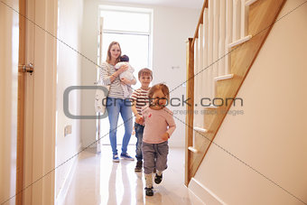 Young Family Looking Around Property For Sale