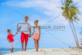 Family on tropical beach