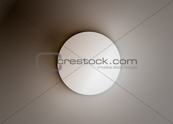 Top view of a white cylinder. Dark background