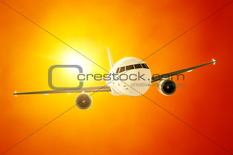 passenger airplane in the evening sun