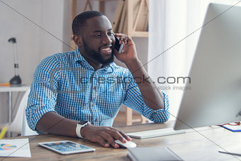 Young african man working in the office business
