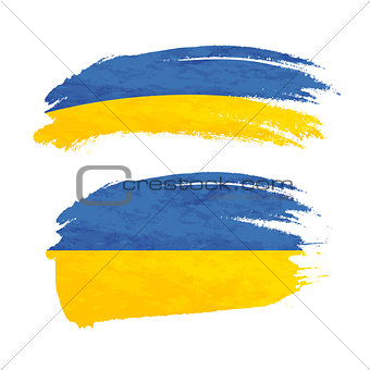 Grunge brush stroke with Ukraine national flag on white