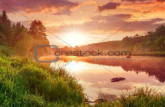 Landscape with sunset on the lake