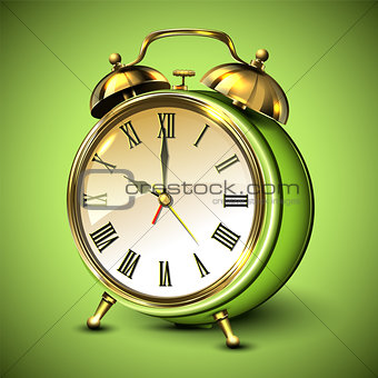 Green retro style alarm clock on green background.