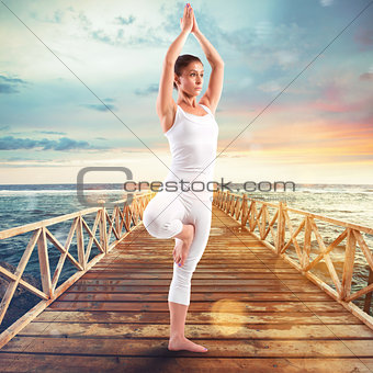 Exercises of gymnastics on a pier