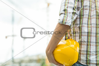 Photo of builder with helmet