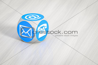 turquoise cube with signs for email phone and letter