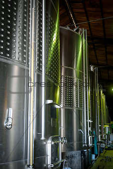 metal wine barrels in a winery