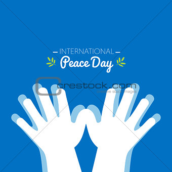 International peace day with hands making the shape of a dove