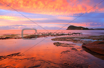 Stunning red sunrise over Lion Island from Pearl Beach